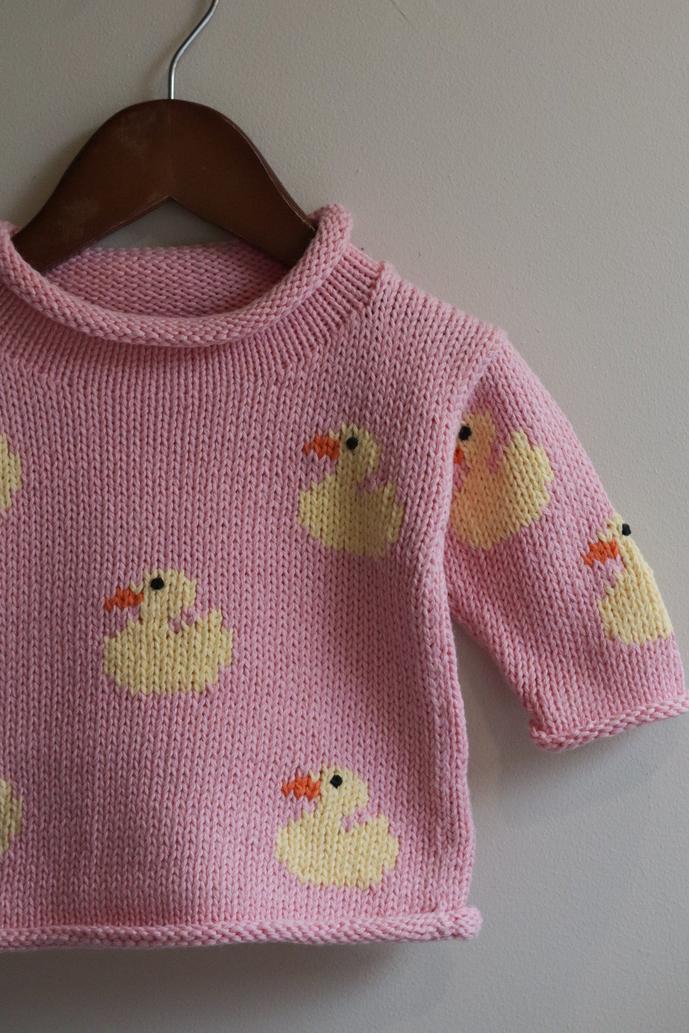 Roll Neck Ducks All Over Sweater Pink